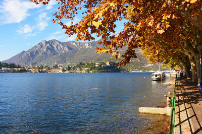 Scenic view of sea and mountains against sky