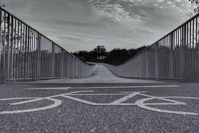 Surface level of bridge against sky