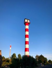 Low angle view of tower against clear blue sky