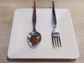 High angle view of wineglass on table