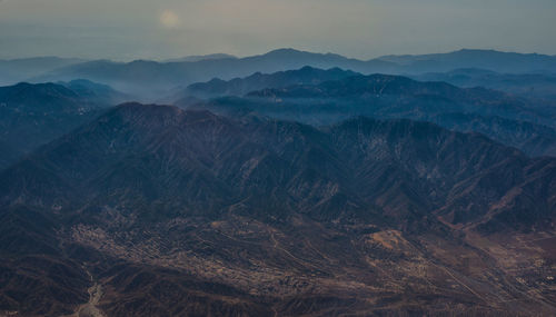 Scenic view of mountains range against sky