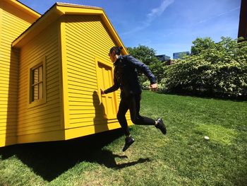 Full length of man standing on golf course