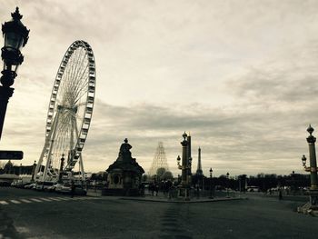 City skyline against cloudy sky