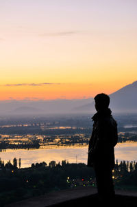 Scenic view of landscape at sunset