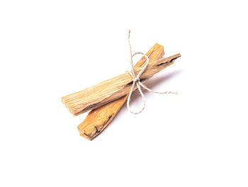 Close-up of dry leaves on white background