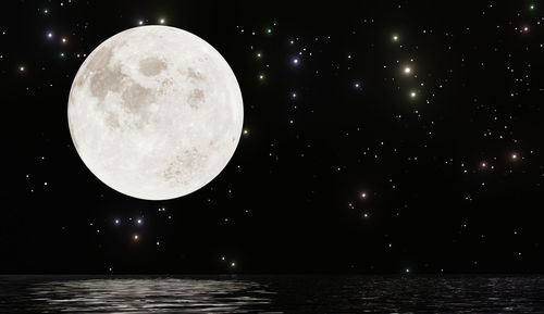 Scenic view of moon against sky at night