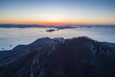 Scenic view of mountain against sky during sunset