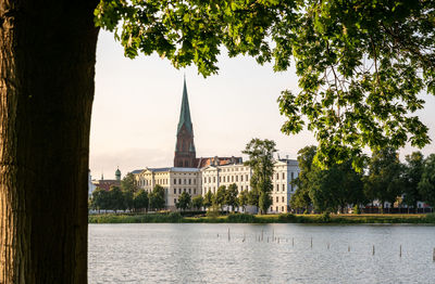 View of river with buildings in background