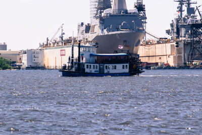 Nautical vessel on sea against sky