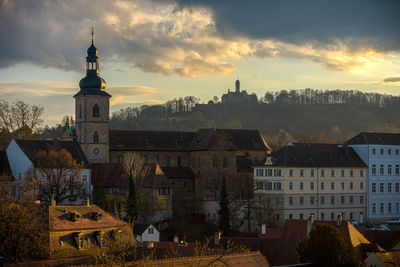 Michaelsberg abbey in town against sky