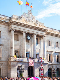 Group of people in front of historical building