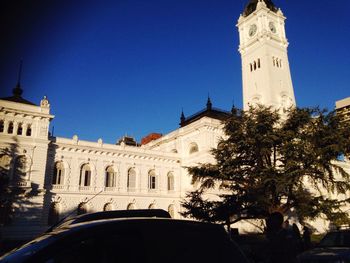 Low angle view of church against clear blue sky