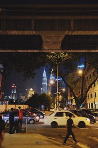 View of traffic in city at night