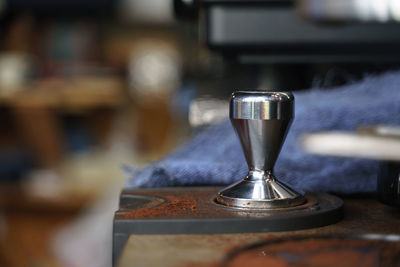 Close-up of wine glass on table