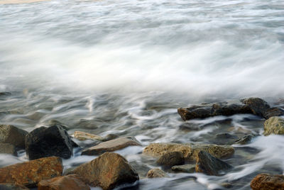 Turbulence seawater and rock at coastline