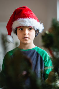 Portrait of young woman in warm clothing
