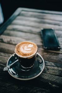 Coffee cup on table