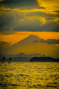 Scenic view of sea against sky during sunset