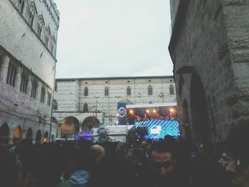 People in front of building