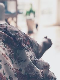 Low section of person lying on floor