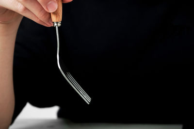 Close-up of woman eating meal