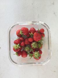 High angle view of strawberries on table