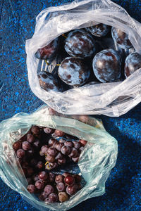 High angle view of fruits in container on table