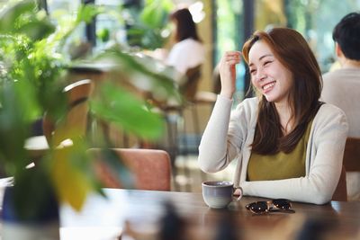 Young woman using mobile phone