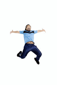 Portrait of man jumping against white background