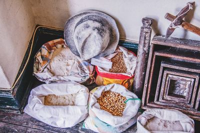 High angle view of food in sacks on floor at home