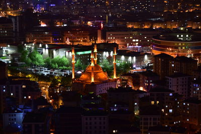 High angle view of illuminated buildings at night