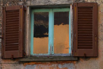 Closed window of old house