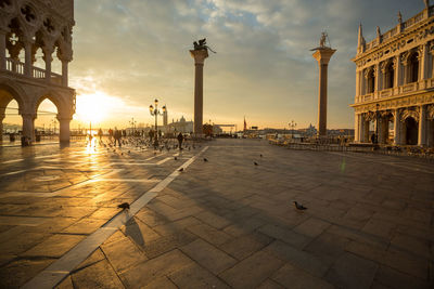 Panoramic view of buildings against sky during sunset