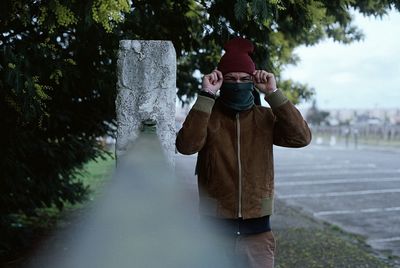 Portrait of man in warm clothing outdoors