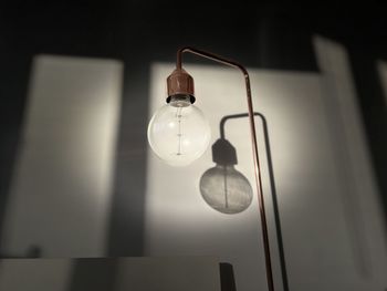 Close-up of illuminated light bulb