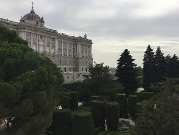 View of historical building against cloudy sky