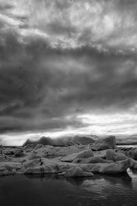 Scenic view of sea against cloudy sky