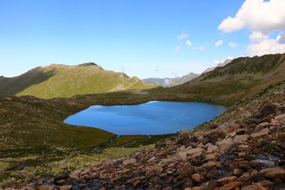 Scenic view of landscape and mountains against sky