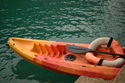 High angle view of kayak moored on shore