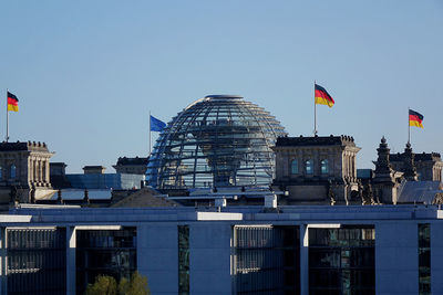 Low angle view of buildings against clear sky