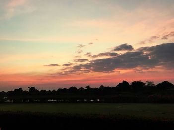 Scenic view of silhouette landscape against sky during sunset