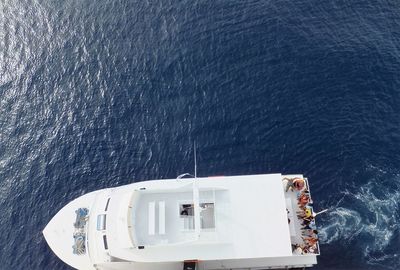 High angle view of ship sailing in sea