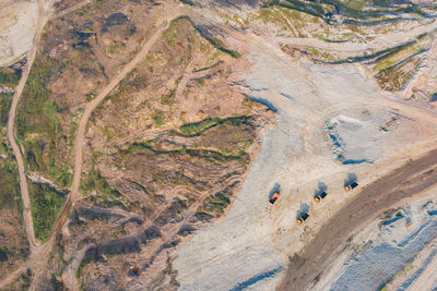 High angle view of road passing through land