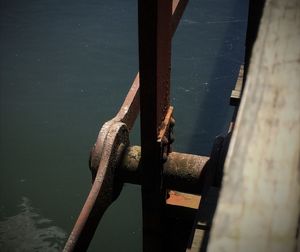 Pier on calm sea against sky