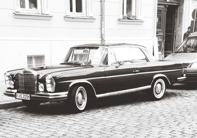 Cars parked in front of building