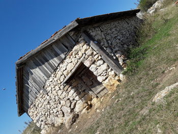 Low angle view of old building against sky