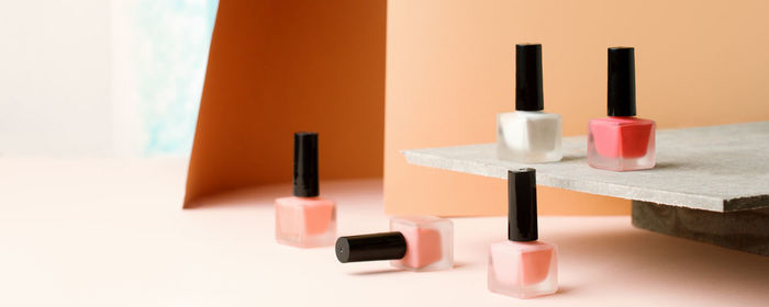 Close-up of nail polish on table