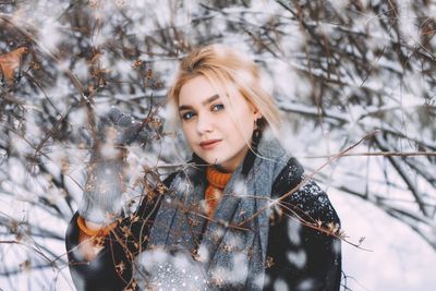Portrait of young woman in winter