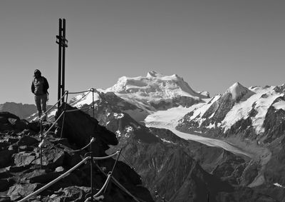 Scenic view of snowcapped mountains against clear sky