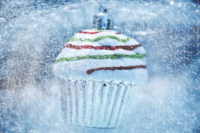 Close-up of water splashing on white background